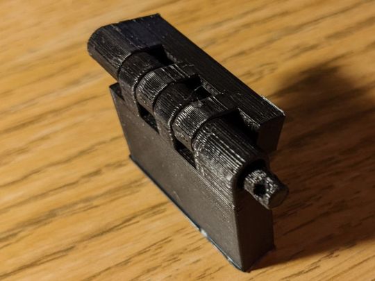 Servo-based lock design using a sliding pin.