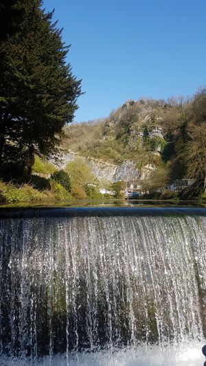 A waterfall in Cheddar. I like how the water divides the photo in half, and how much energy there is in the water.