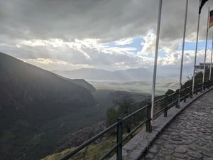 The view from Delphi to the Gulf of Corinth. I love the sun rays in the distance, with the contrast between the light there and the cloudliness up close.